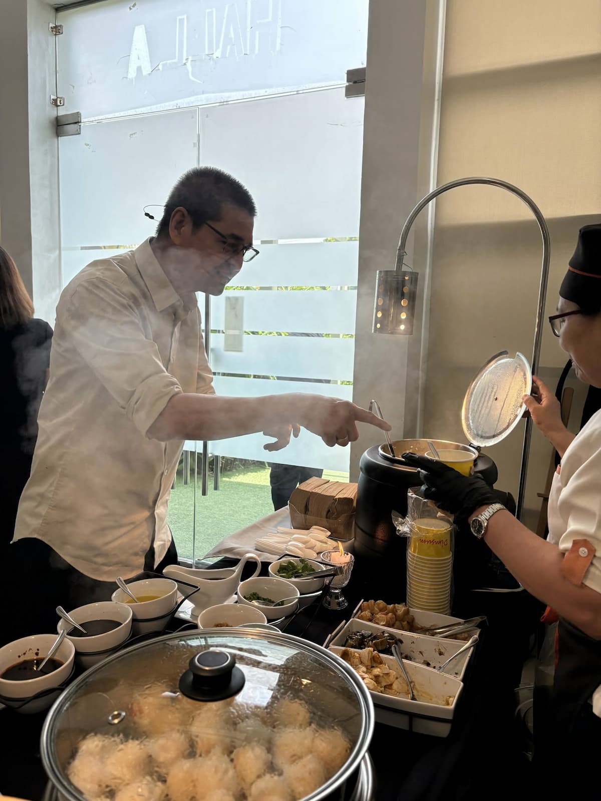 Chef serving congee at live station