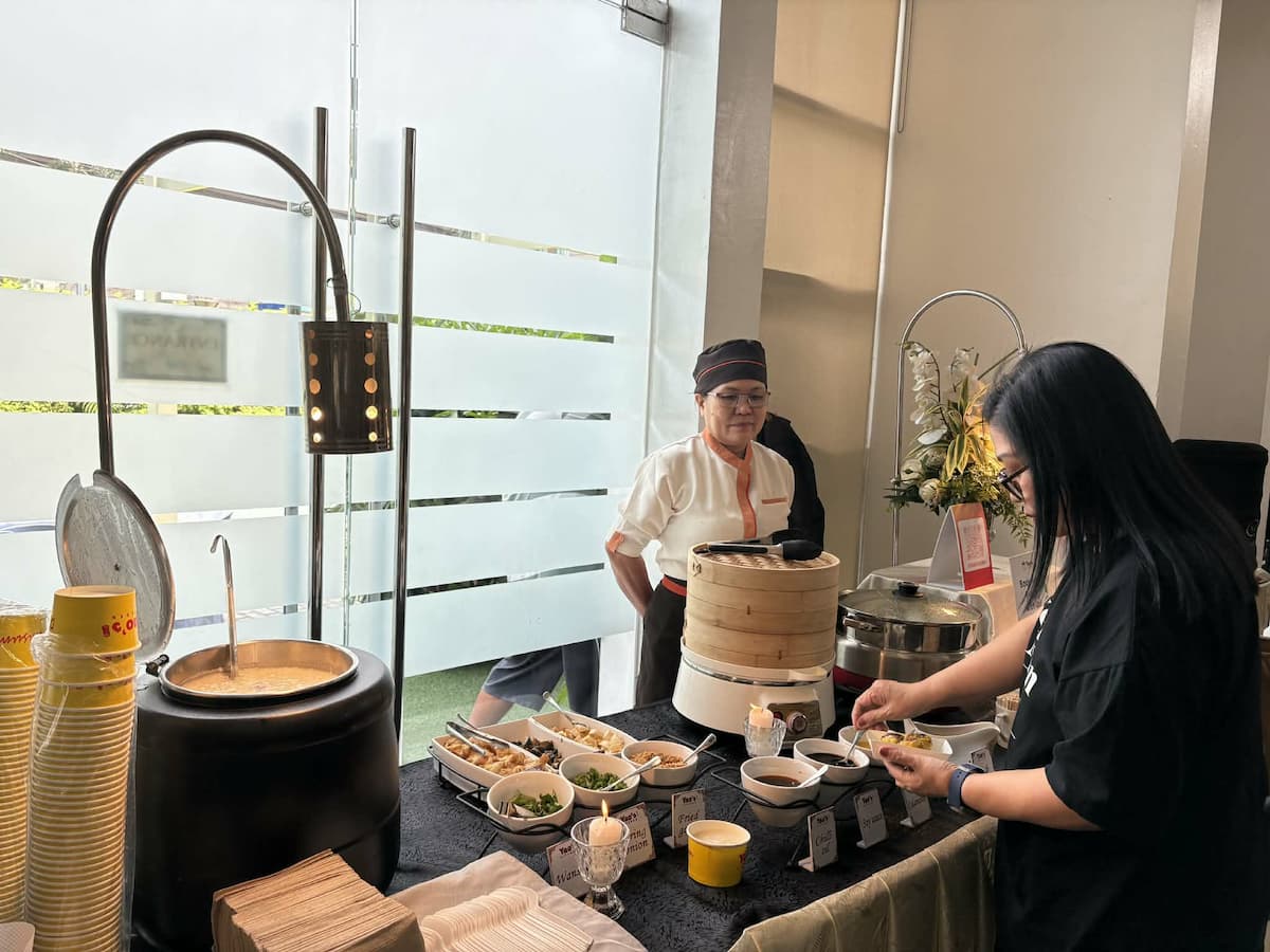 Staff serving guests at event